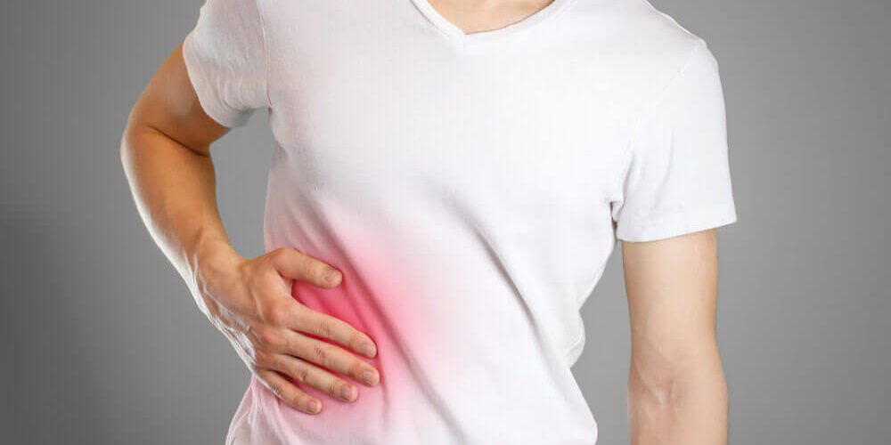 Боль под ребрами справа